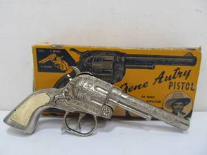 lot 131 image: Vintage Gene Autry 50-Shot Western Repeater Cap Gun wBox