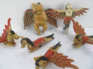 lot 142 image: Group of Carved Wood Painted Hanging Winged Figures