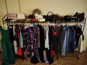 Three Clothing Racks with Vintage Clothing and Accessories