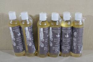 lot 86 image: Herbal Therapy Soothing Touch Bath, Body, and Massage Oil