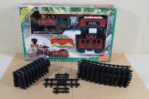 lot 123 image: North Pole Express Battery Operated Christmas Train Set with Extra Track