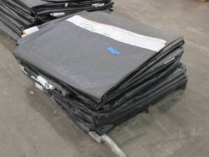 lot 543 image: Pallet of 13 PE Vinyl Billboard Tarps - 14 ft x 48 ft 5 oz. B Grade with Channels - 260 lbs