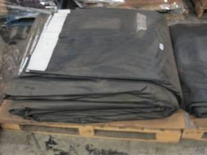 lot 549 image: NEWSOME HOLES 50 x 85 ft. 13 oz. Vinyl Tarp BlackWhite New - 330 lbs - 4250 sq ft
