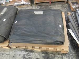 lot 550 image: NEWDIRTYSOME HOLES 50 x 70 ft. 9 oz. Lightweight Vinyl Tarp BlackWhite New - 180 lbs - 3500 sq ft