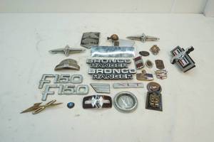 lot 84 image: vehicle emblems
