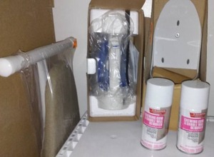 lot 2 image: NEW Iron, Caddy, Ironing Board and Spot Remover.