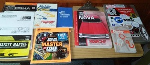 lot 33 image: Misc. Books, Clipboard, and Metal Work Portfolio.