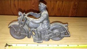 lot 39 image: Cast Metal Motorcycle and Police Rider.
