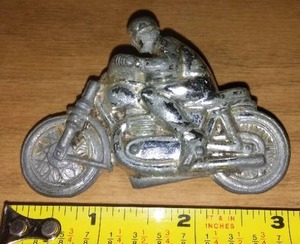 lot 46 image: Cast Chromed Motorcycle and Rider.