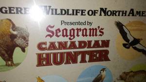lot 109 image: Framed Seagrams Endangered Wildlife of North America.