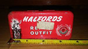 lot 127 image: Halfords Retube Outfit. Empty Tin.