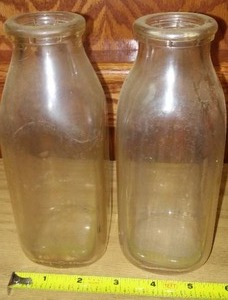 lot 197 image: Milk Bottles (2) Vintage, Pint