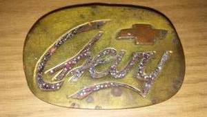 lot 253 image: Chevy brass belt buckle.