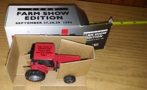 lot 737 image: ERTL Case IH 1994 Farm Show Edition Tractor in box and Packing.