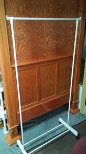 lot 746 image: Rolling Clothing Rack.