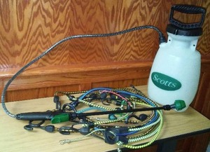 lot 770 image: Bungee Straps and Yard Sprayer.