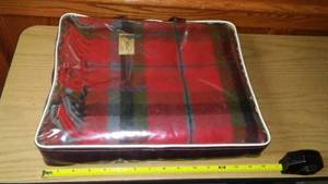 lot 799 image: 100% Wool Blanket in Plastic Liner. Faribo Brand.