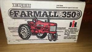 lot 807 image: ERTL Farmall 350  NEW in Sealed Box.