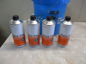 4 cans of racing gas additives