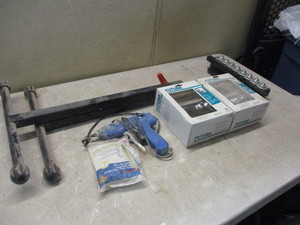 Roller Sawhorse, glue gun and tp dispensors