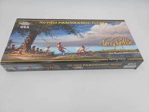lot 4 image: TERRY REDLIN 700 PIECE PANORAMIC PUZZLES