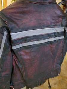 lot 12 image: NEW HEIN GERICKE WOMANS LEATHER JACKET