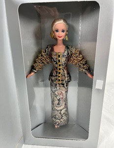 lot 64 image: CoutureDesigner Barbies - Calvin Klein, Escada, Christian Dior, Byron Lars - In the Limelight, New in Box