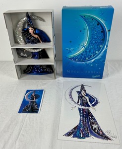 lot 63 image: Bob Mackie 1994 Queen of Hearts Barbie #12046 & 1996 Moon Goddess Barbie #14105 in Box with Concept Sketch