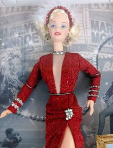 lot 1 image: 3 Barbies as Marilyn Monroe, Boxes & COAs - Hollywood Legends
