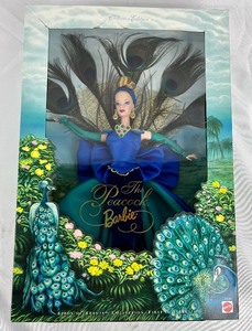 lot 75 image: Lot of 2 Fashion Barbies Millicent Roberts - Pinstripe Power & Birds of Beauty -The Peacock - New in Box