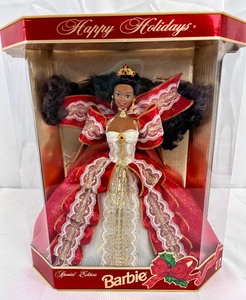 lot 87 image: Lot of 3 Holiday Barbies Happy Holidays #17833 & 15646 and Hallmark Holiday Memories Collection #14106 - New in Box