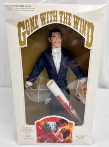 lot 86 image: World Dolls Gone With the Wind Rhett, Scarlett in Wedding Dress, Drapery Dress, & Red Dress