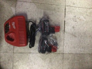 lot 4 image: Milwaukee M12 12-Volt Lithium-Ion Starter Kit with Two 6.0 Ah Battery Packs and Charger
