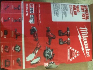 lot 28 image: Milwaukee M18 18-Volt Lithium-Ion Cordless Combo Tool Kit (7-Tool) with Two 3.0 Ah Batteries, Charger and Tool Bag