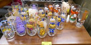 Large group of 21 character glasses. McDonalds and Daffy Duck and Sylvester and Tweety