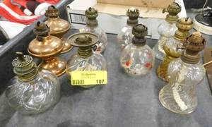 Group of 13 small kerosene lamps