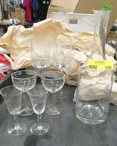 Group of drinkware - set of 6 of the tall glasses, set of 10 of the next size down and 2 of the cordials and one decanter.  All are clear glass with an etched pattern, all in excellent condition