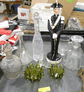 Group of bar ware decanters and 2 green ashtrays