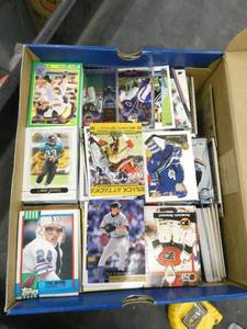 Shoe box full of Baseball, football, basketball trading cards, hundreds of cards