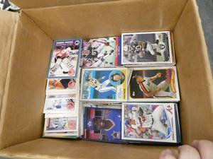 Large box full of Baseball, football, basketball Trading cards, a couple thousand cards
