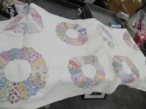 Lot of 3 vintage handmade quilts - the first one has stains and would need cleaning, but I did not see any issues with the green and yellow one and only a small spot on the pink one