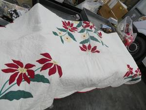 Lot of 4 vintage handmade quilts packed in a trunk - all have condition issues, stains or tears that would need cleaning or repair