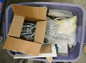 Tote full of hardware, bolts, sheetrocking, electrical