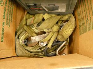 Ratchet strap, storage box and reflective vest