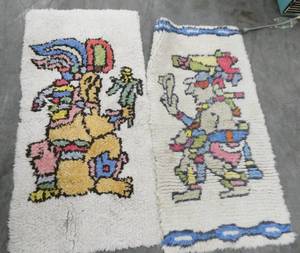 2 unique rugs and a hand stitched tablecloth