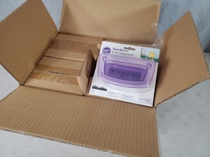 lot 172 image: New Case of 12 Wilton Suger Sheets Border Cutting Inserts for Cake Decorating