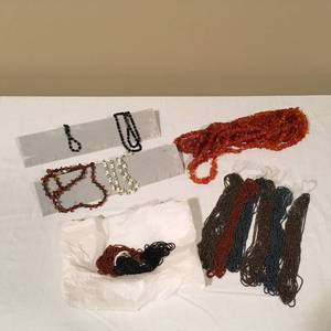 lot 217 image: Multiple Sets of Beads on String