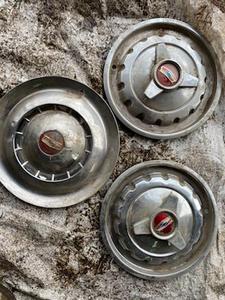 lot 90 image: 3 Older Hubcaps