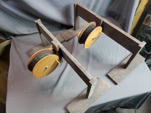2 Wooden Rattle Wheels on Homemade Stands