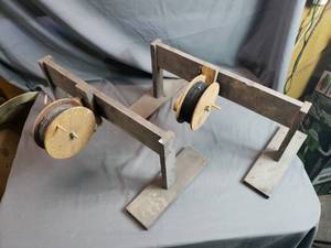 2 Wooden Rattle Wheels on Homemade Stands